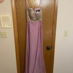 Stunning mauve and gold prom dress.
